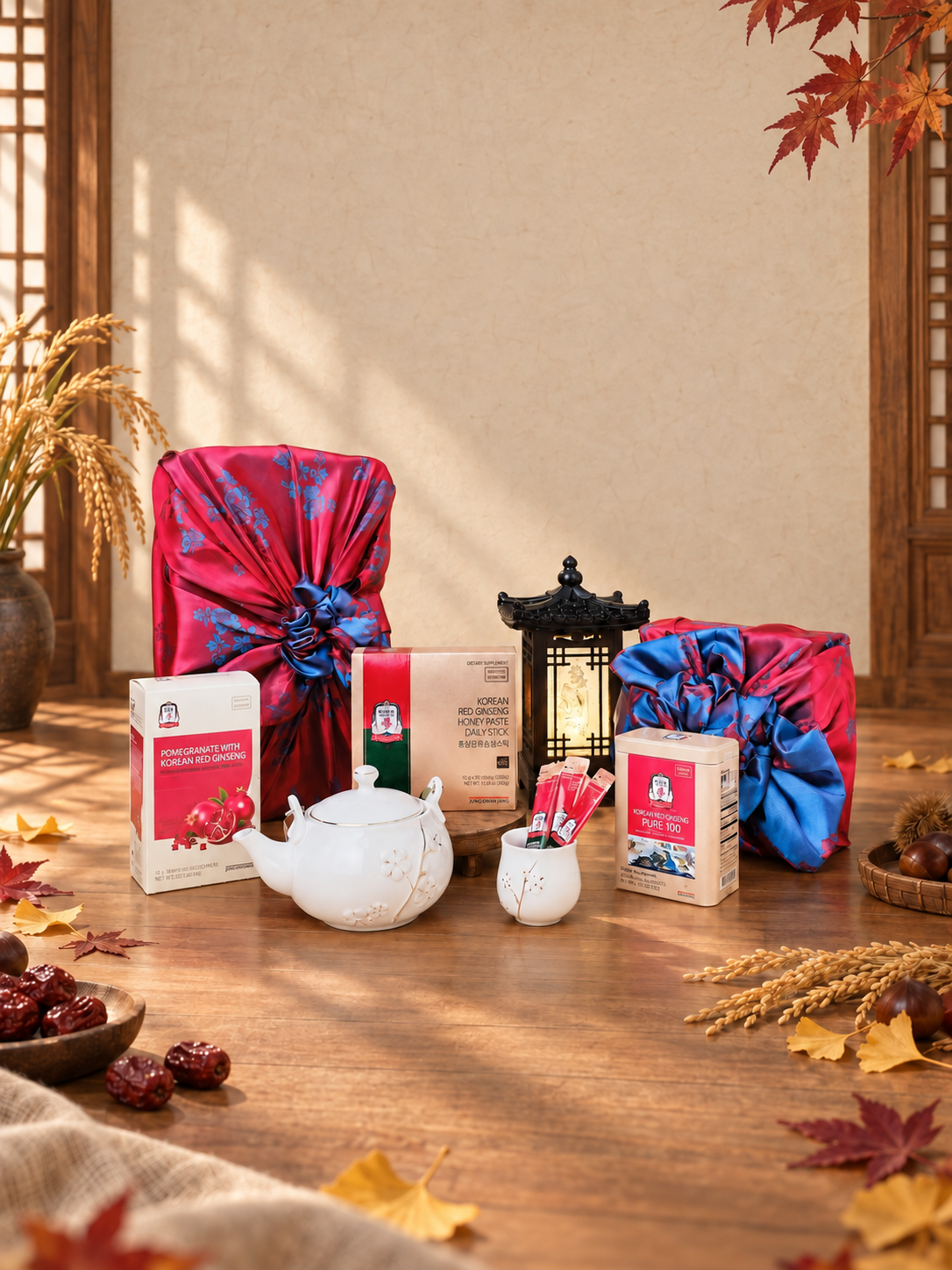 A Jung Kwan Jang red ginseng gift set with bojagi-wrapped boxes, a teapot, and ginseng stick packs styled for the holidays